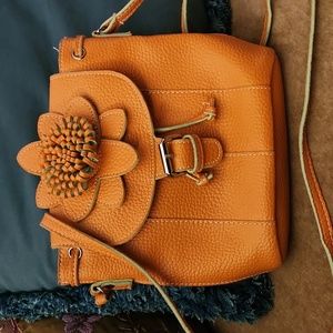 Women’s Noelle orange crossbody purse handbag w/flower